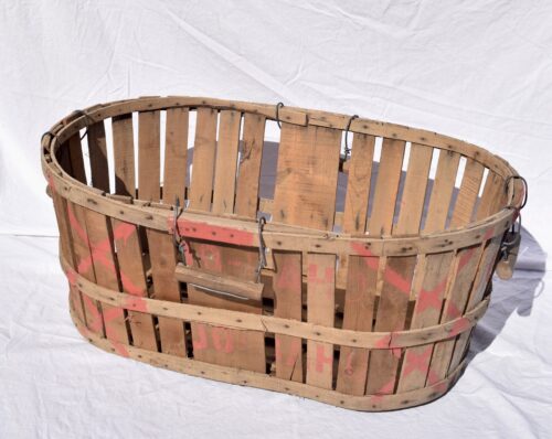 A LARGE FRENCH BENTWOOD FRUIT BASKET, CIRCA 1950S