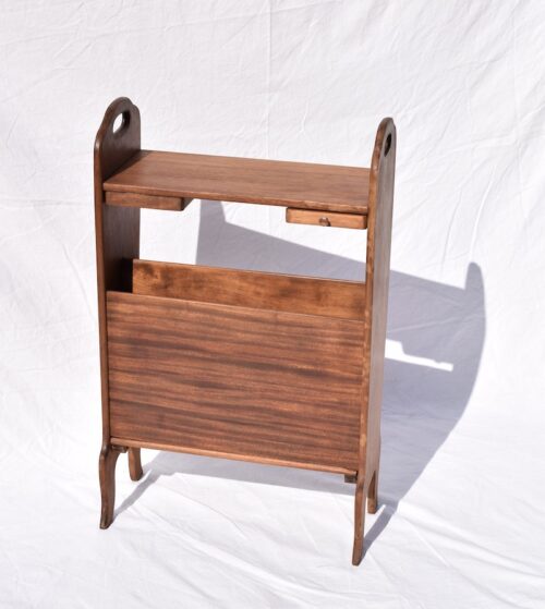 A 1950s TEAK MAGAZINE WOODEN STAND