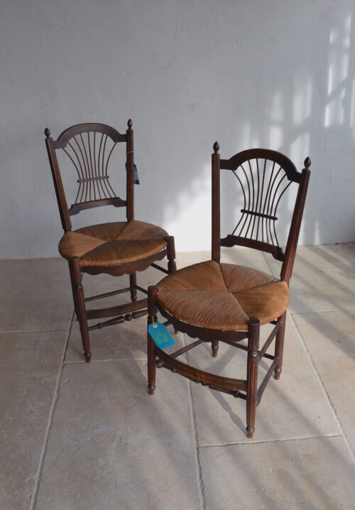 A PAIR OF 1930s FRENCH DINING CHAIRS WITH RUSH SITTING
